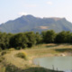 Il laghetto per l'irrigazione e veduta del Monte Strega